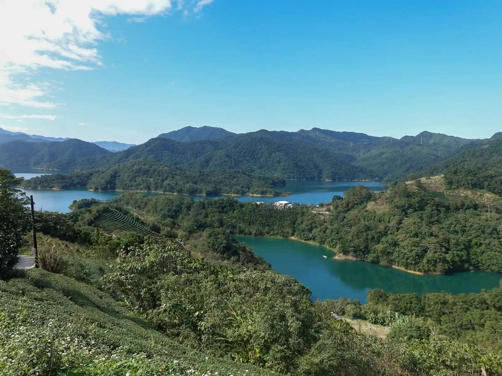 Multiple layers of mountains can be seen clearly behind Thousand Island Like on a day with perfect weather.