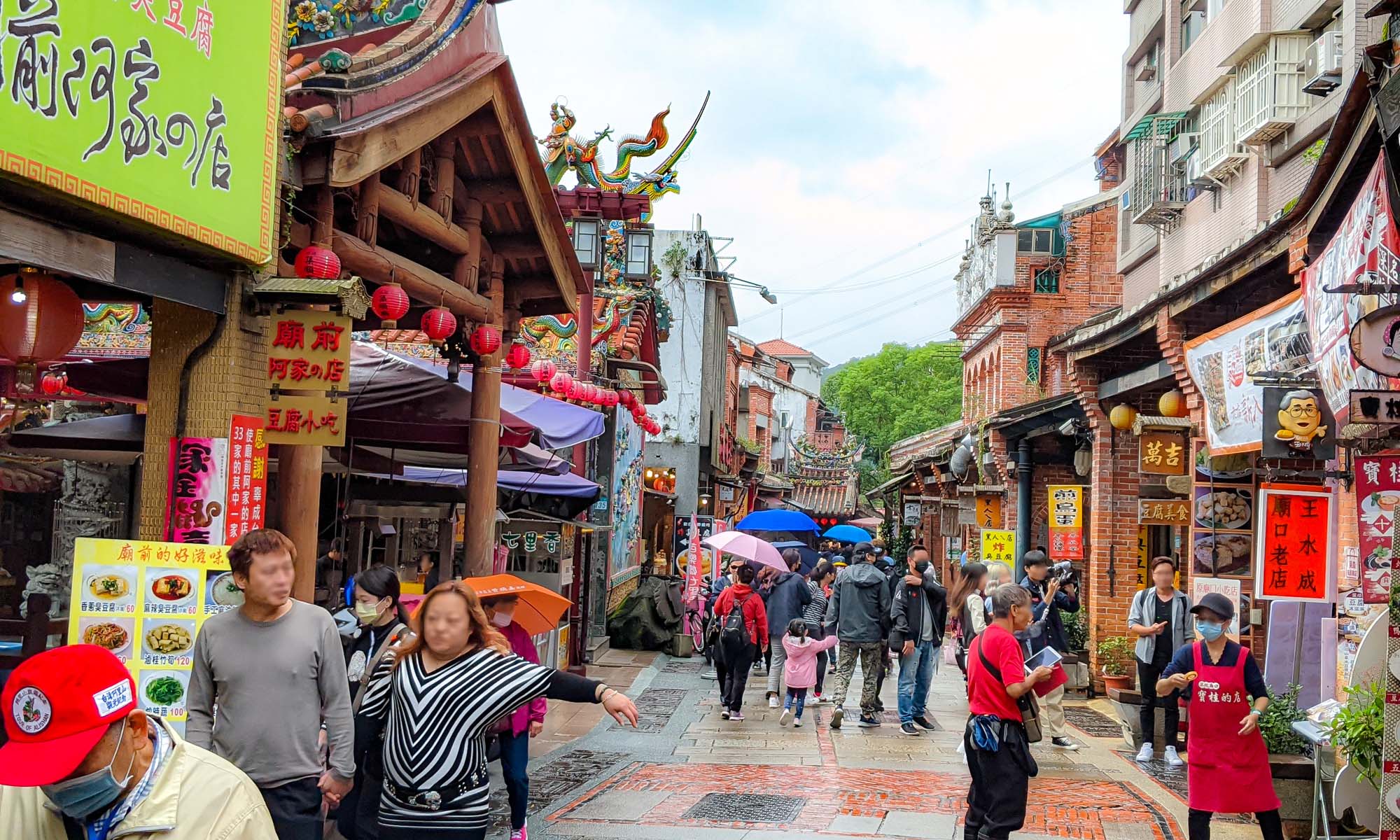 Store facades along the Shenkeng Old Street.