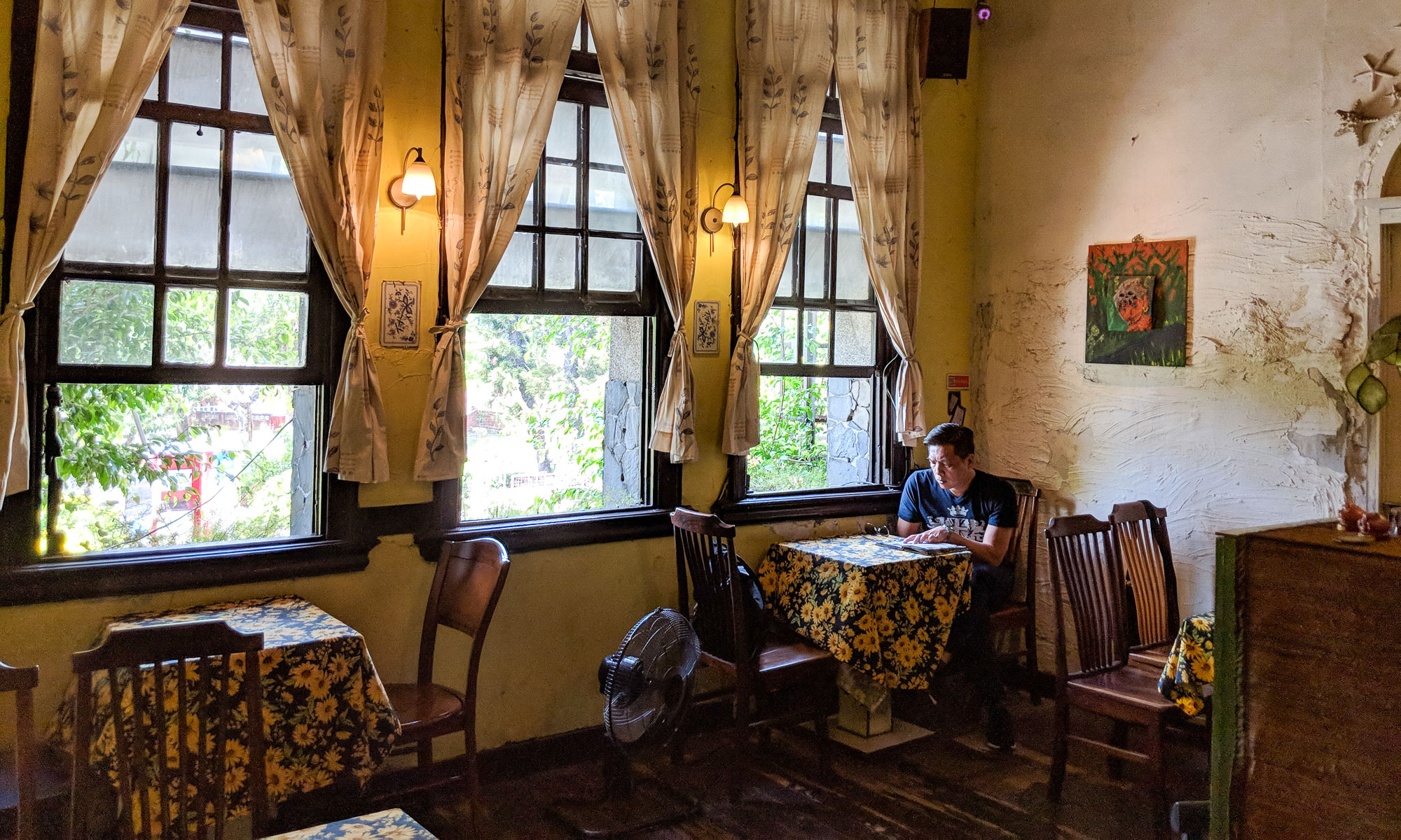 The rustic interior of Narrow Door Cafe.