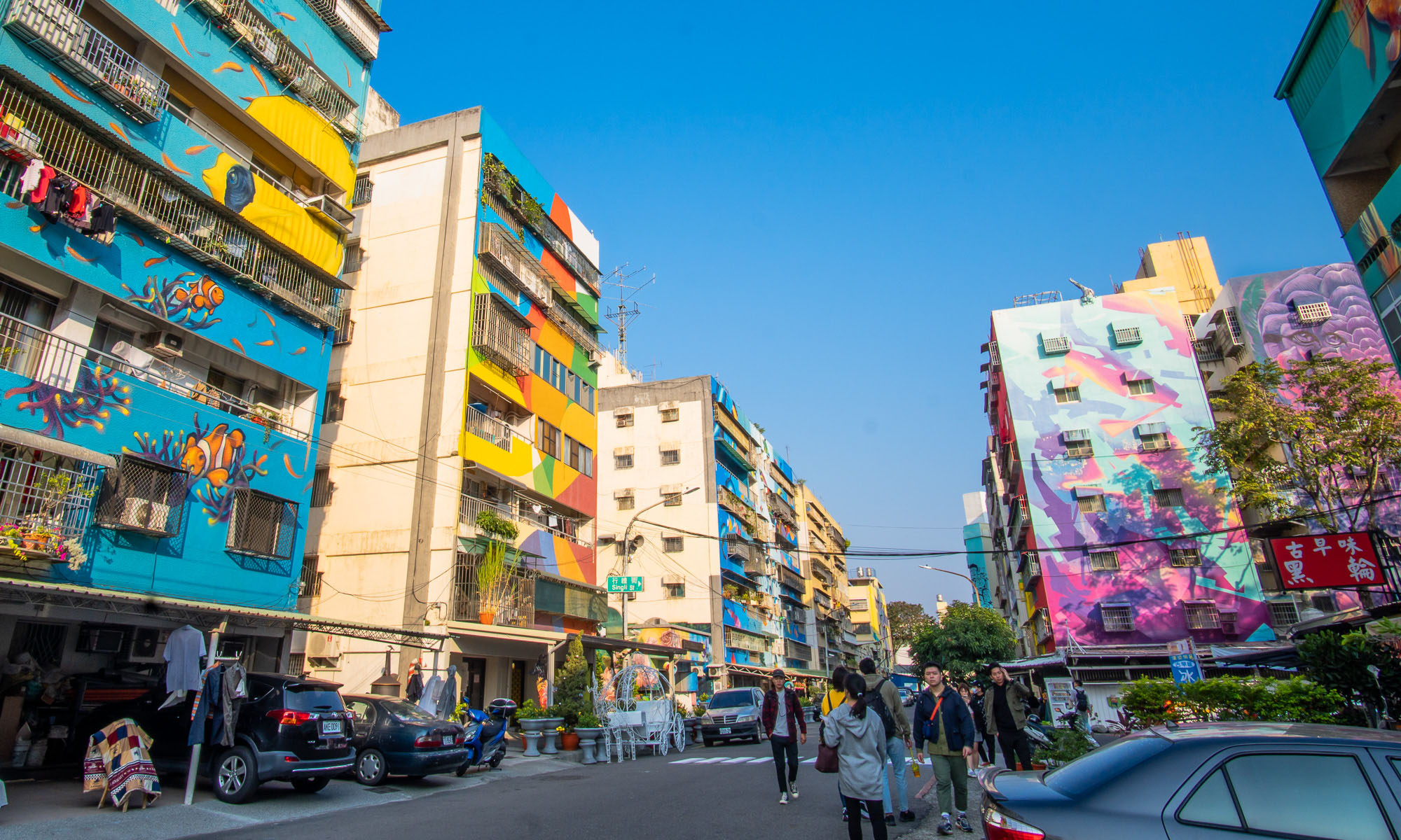 Colorful murals cover the entirity of building walls in Weiwu Mimi Street Art Village.