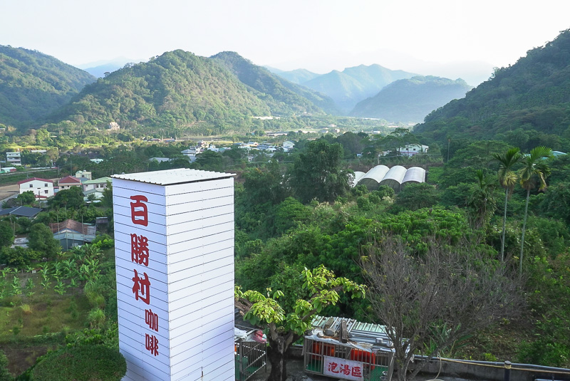 Looking out at the surrounding mountains at Baishengcun Coffee Farm.