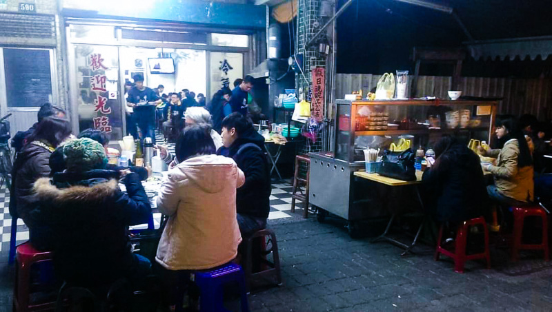 A stand serving beef soup is open late into the night.