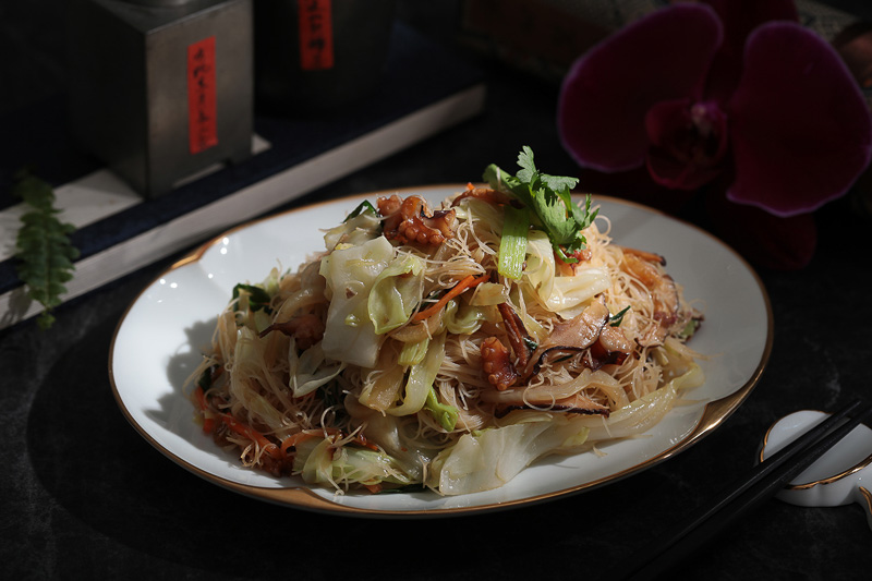Stir-fried Rice Noodle with toasted shrimp, Penghu squid, shiitake mushrooms, and seasonal veggies.
