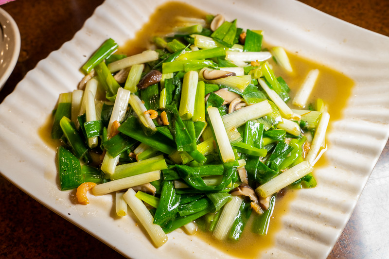 Sanxing Scallions served stir-fried are a popular side dish.