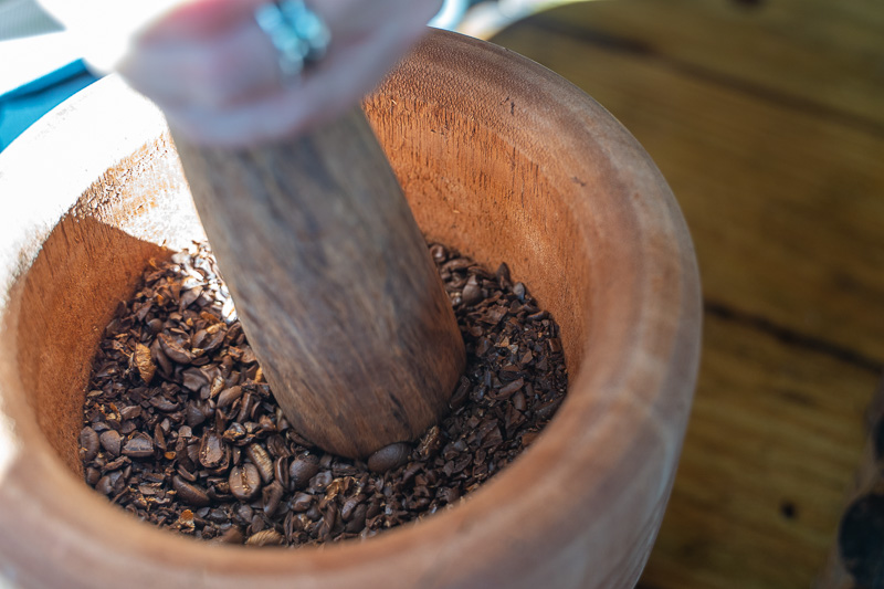 Grinding coffee beans.