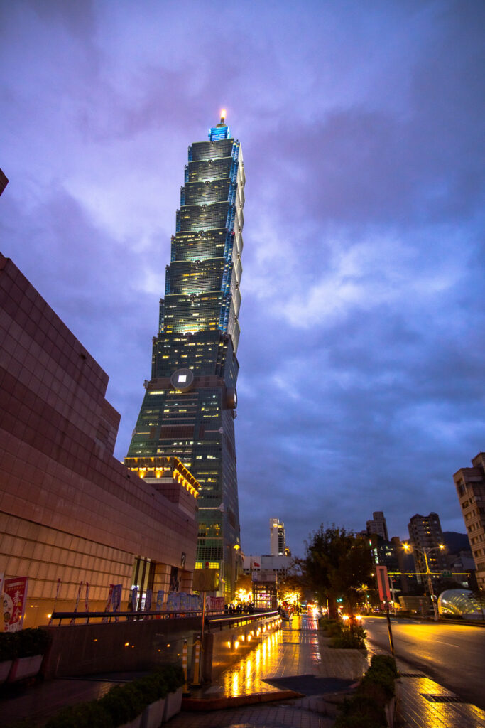 Taipei 101 viewed from the street and at night.