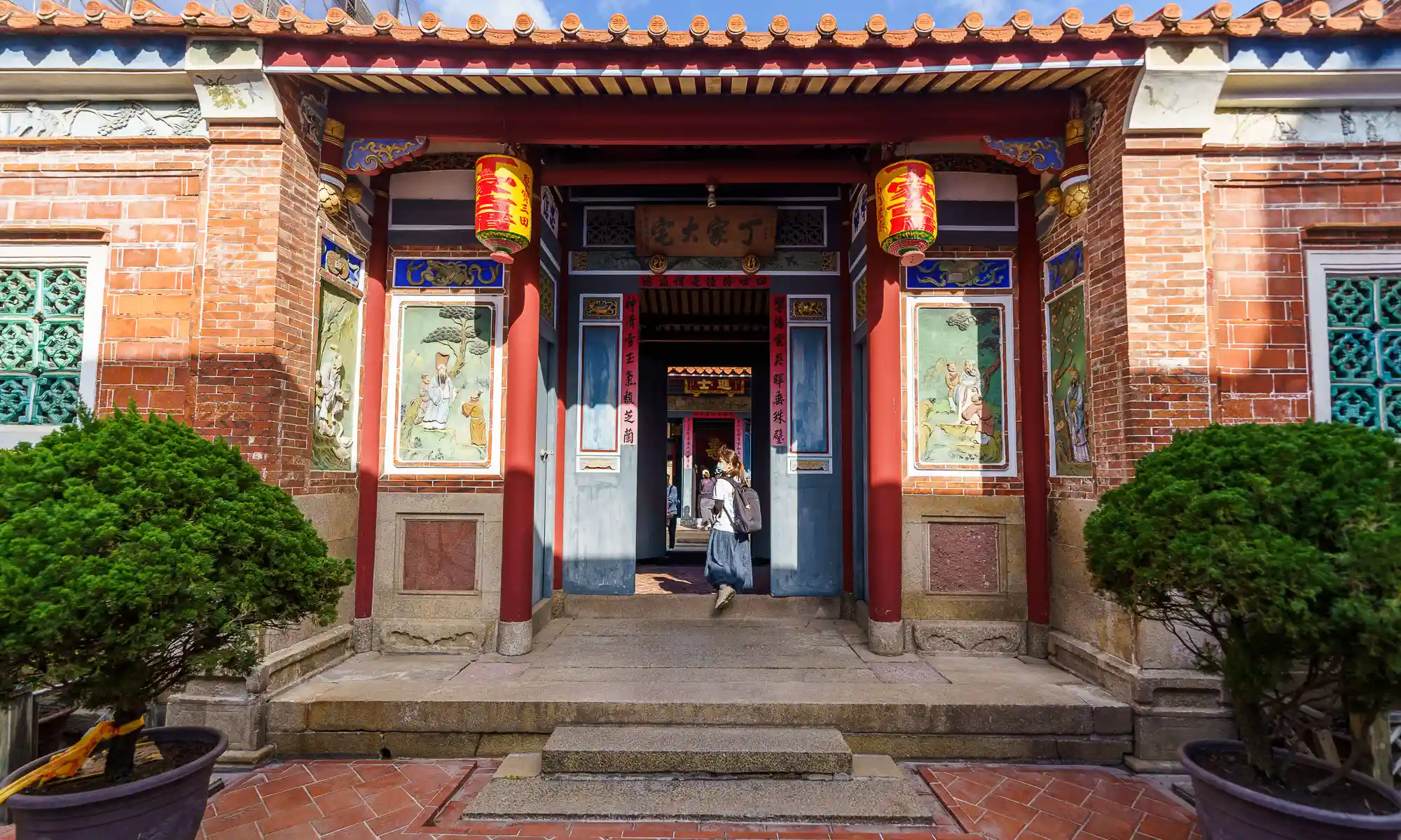 The colorful front facade of the Dingjia Residence historic building.