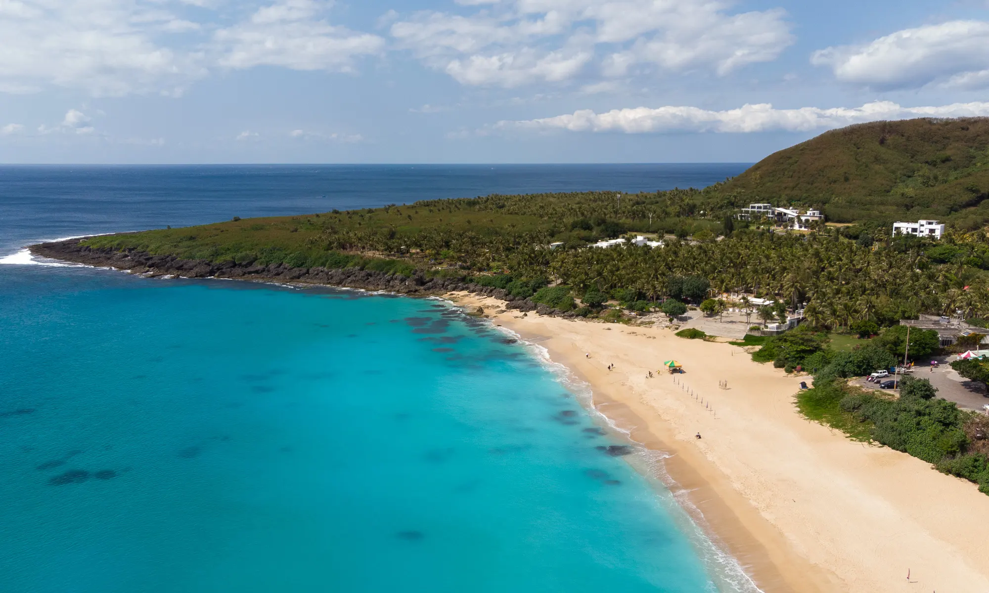 An aerial photo of Baishawan Beach and Baisha Bay.