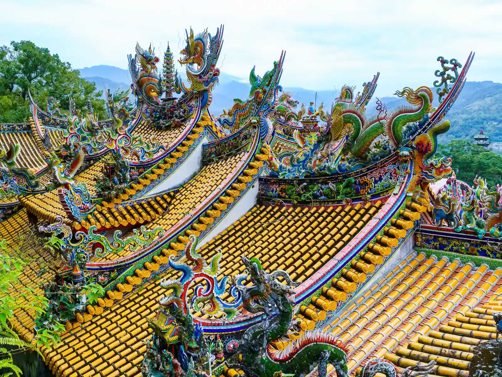 The top of the main hall of Quanhua Temples features elaborate dragon carvings.
